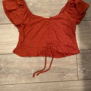 red/orange cropped shirt women’s